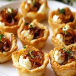Irresistible Caramelized Onion and Goat Cheese Tarts First Image First Image