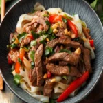 Thai Wide Rice Noodles with Beef First Image First Image