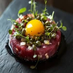 Beef Heart Tartare with Egg Yolk First Image First Image